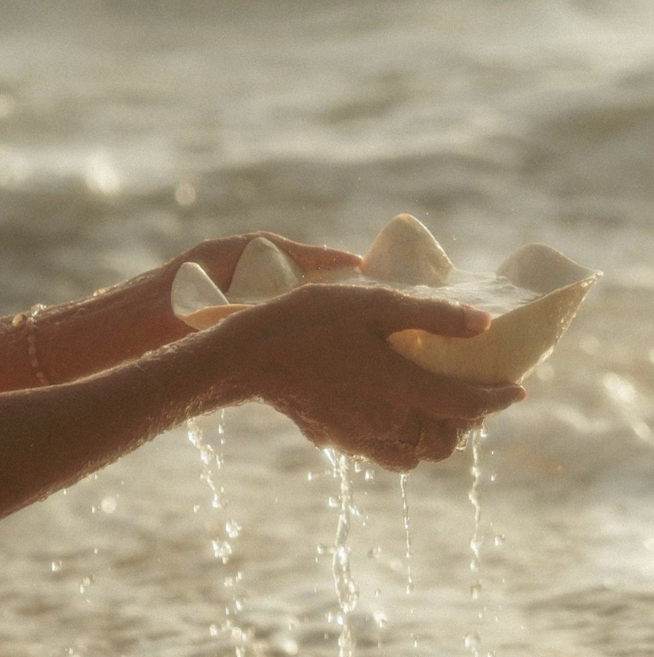Hands and water